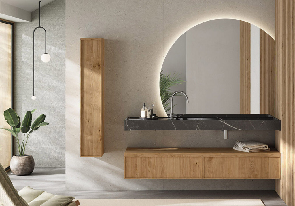 Mueble de baño suspendido de madera con encimera de mármol negro y espejo redondo hecho a medida con iluminación LED. Diseño minimalista y moderno para baños contemporáneos.