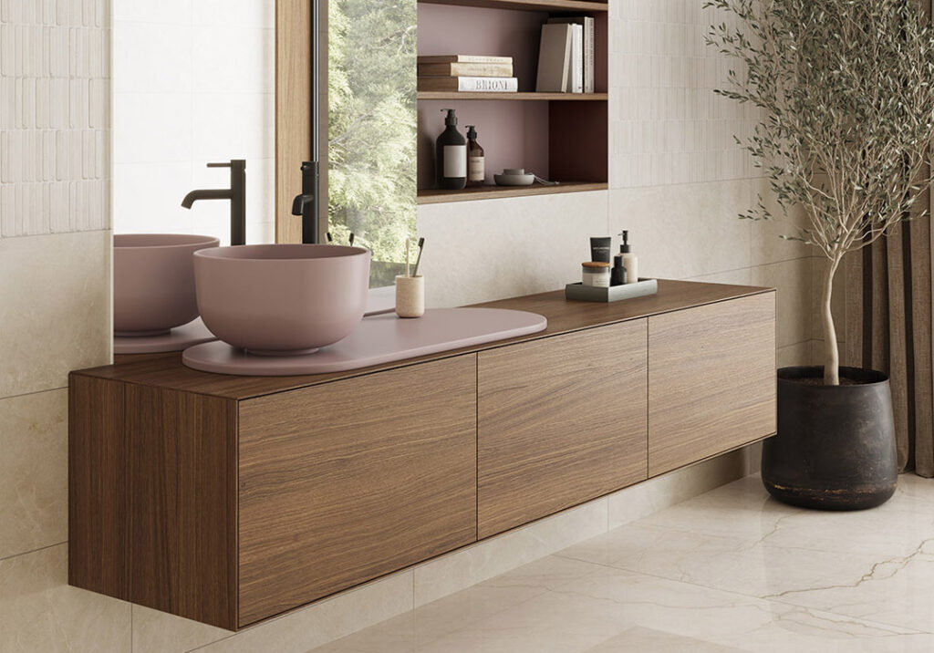 Mueble colección lea de tres cajones con madera y tapa y lavabo en rosa